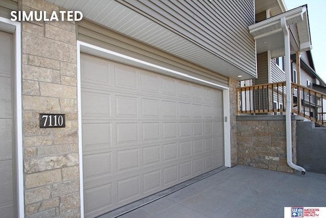 garage featuring driveway