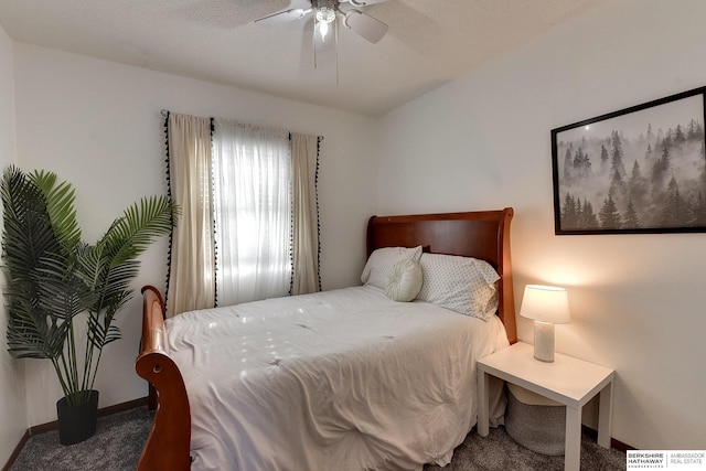 carpeted bedroom featuring a ceiling fan and baseboards