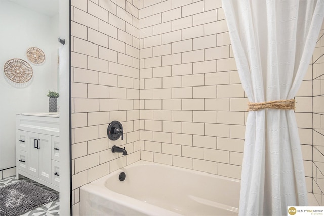 full bathroom with shower / tub combo with curtain