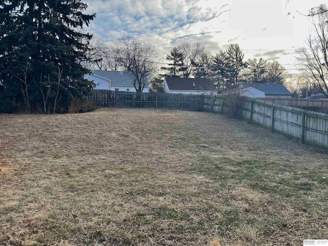 view of yard featuring a fenced backyard