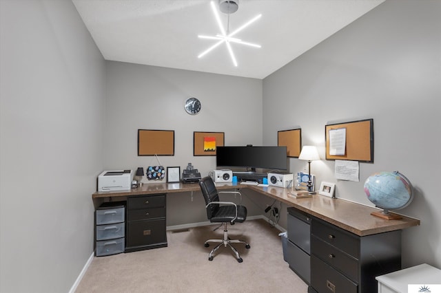 office space with light colored carpet and baseboards