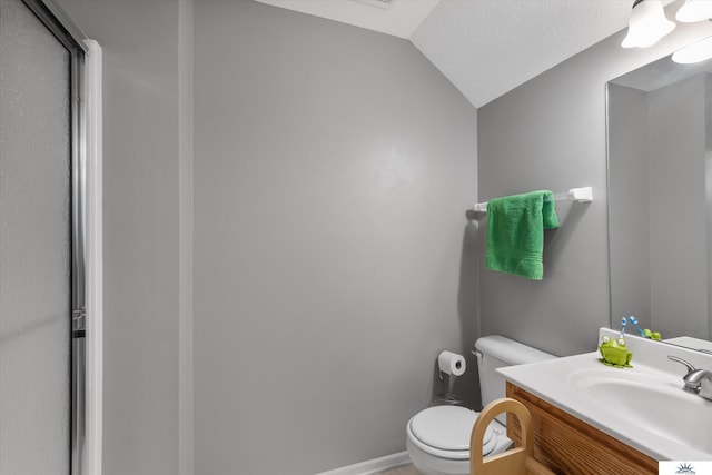 full bathroom with toilet, an enclosed shower, vaulted ceiling, a textured ceiling, and vanity