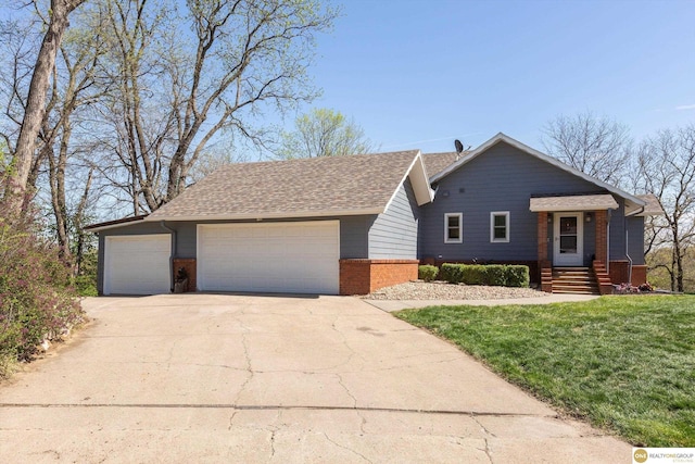 single story home with a garage, a shingled roof, a front lawn, and brick siding