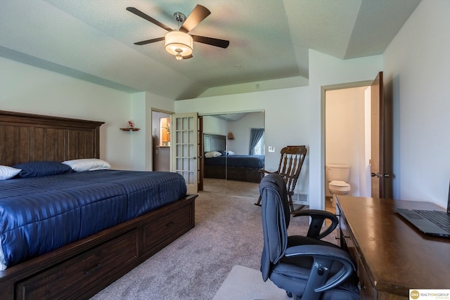 carpeted bedroom featuring vaulted ceiling, ceiling fan, and french doors