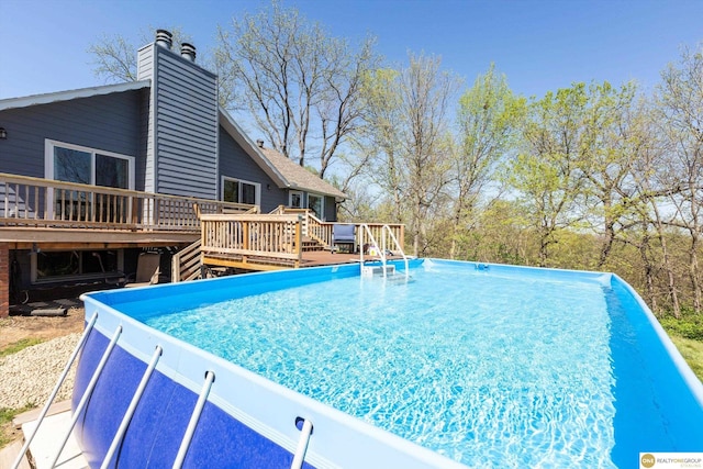 pool featuring a wooden deck