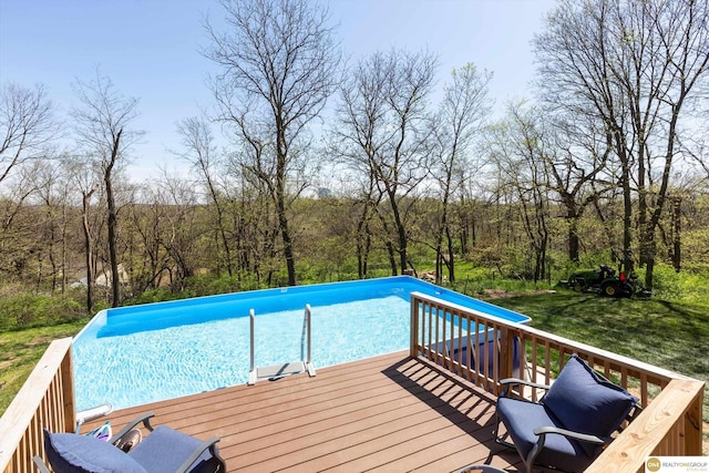 deck with an outdoor pool