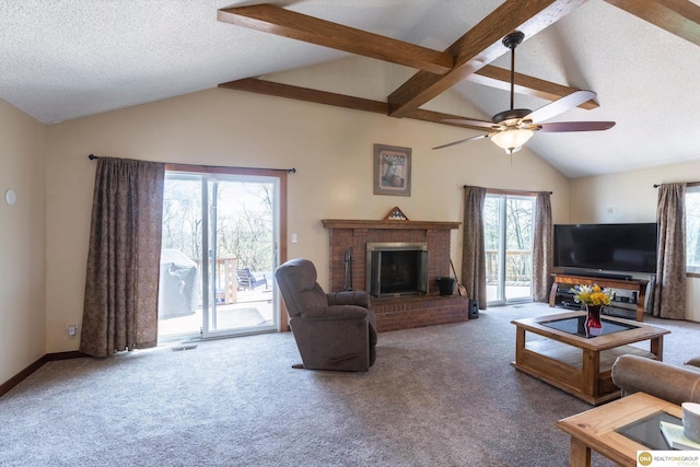 carpeted living room with lofted ceiling, a brick fireplace, ceiling fan, a textured ceiling, and baseboards