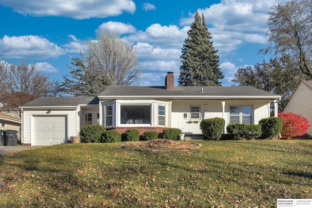 ranch-style home featuring a garage, a chimney, and a front lawn