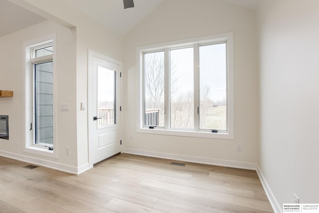 entryway with visible vents, plenty of natural light, and light wood finished floors