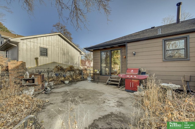 rear view of property with a patio area