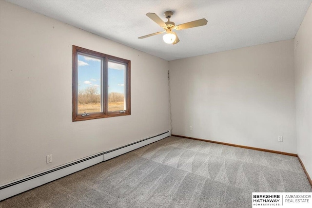 empty room with a textured ceiling, ceiling fan, light colored carpet, baseboards, and baseboard heating