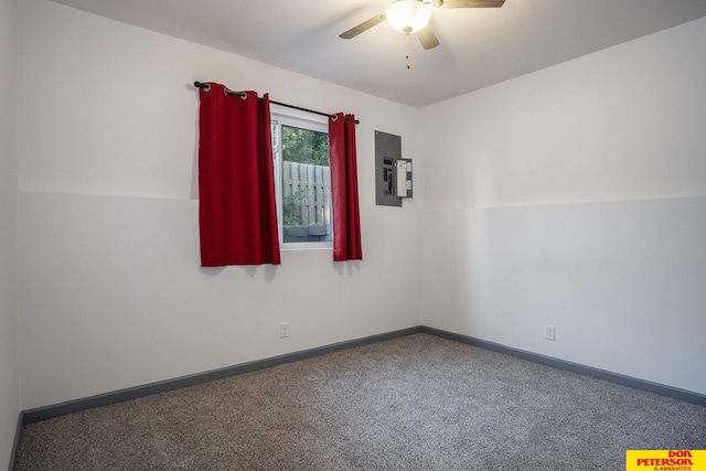 empty room with ceiling fan, electric panel, baseboards, and carpet flooring