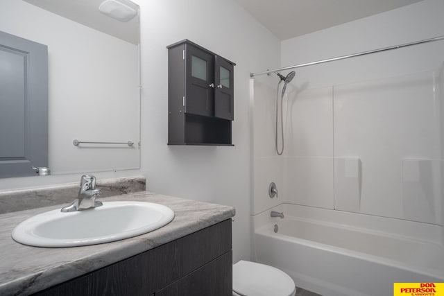 full bathroom featuring shower / tub combination, vanity, and toilet