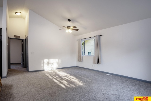 unfurnished room with baseboards, visible vents, ceiling fan, carpet, and high vaulted ceiling