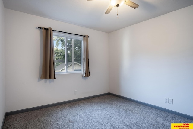 spare room with ceiling fan, baseboards, and carpet flooring