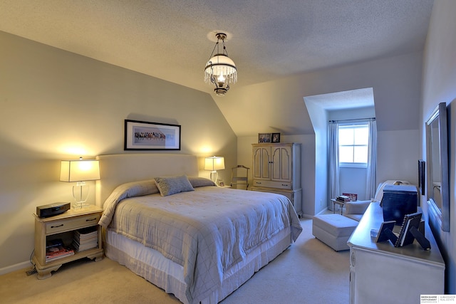 bedroom featuring vaulted ceiling, a textured ceiling, baseboards, and light colored carpet