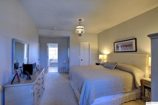 bedroom with light carpet and a notable chandelier