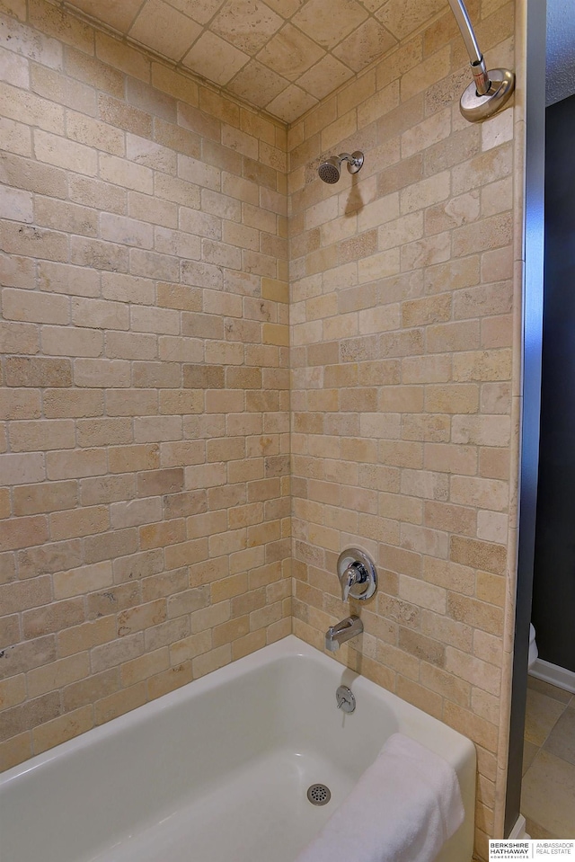 full bathroom with shower / tub combination