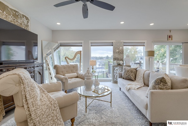 living room featuring a wealth of natural light and recessed lighting