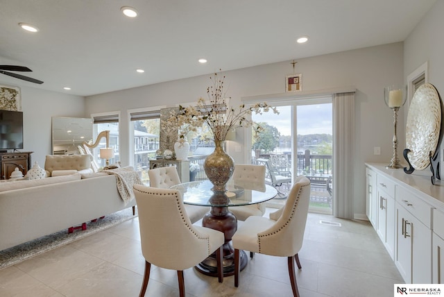 dining room featuring light tile patterned floors, visible vents, a ceiling fan, and recessed lighting