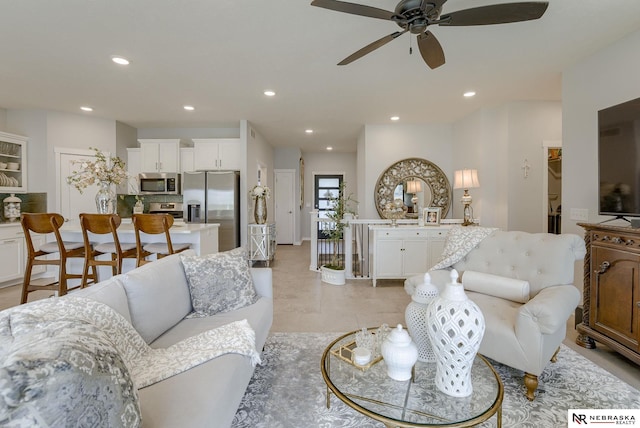 living room with recessed lighting and ceiling fan