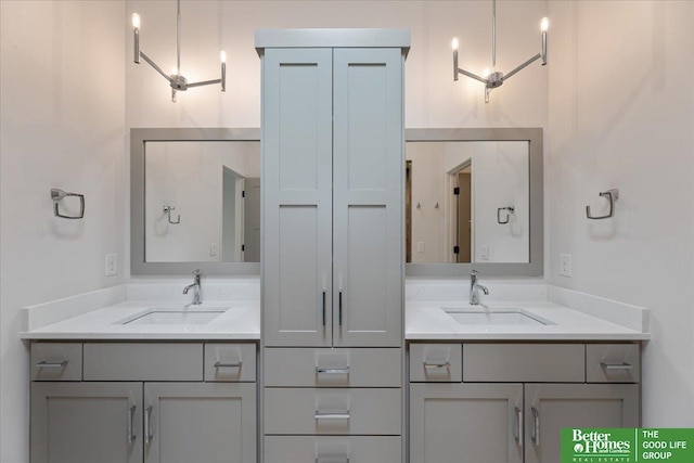 full bath featuring a sink and double vanity