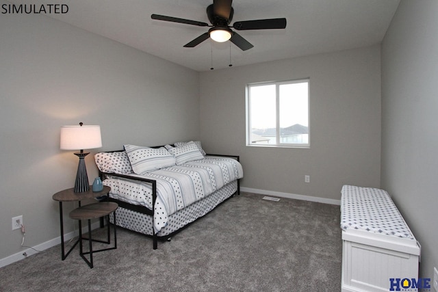 carpeted bedroom with visible vents, ceiling fan, and baseboards