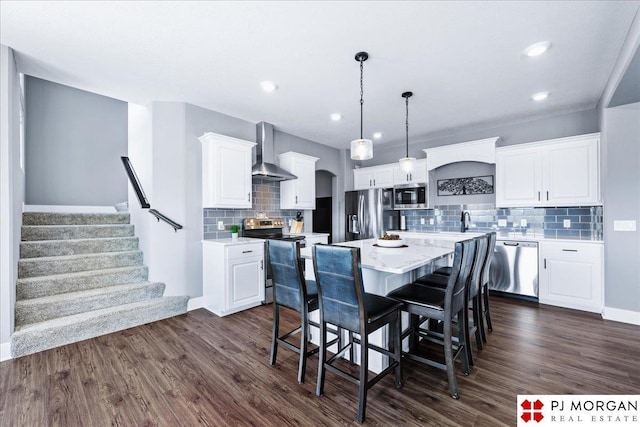 dining area with arched walkways, dark wood finished floors, baseboards, and stairs