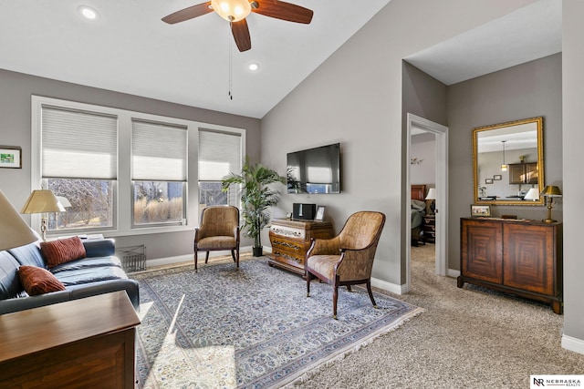 carpeted living area with recessed lighting, baseboards, lofted ceiling, and ceiling fan