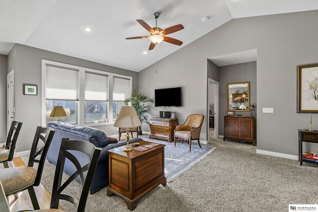 living room featuring baseboards, lofted ceiling, recessed lighting, ceiling fan, and light colored carpet