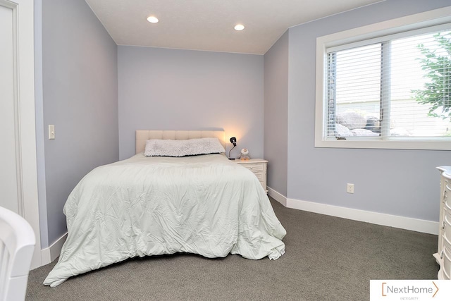 carpeted bedroom featuring recessed lighting and baseboards