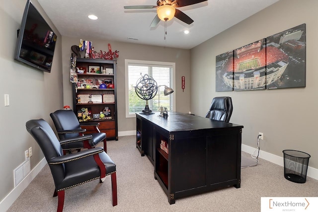 office area featuring light carpet, visible vents, baseboards, a ceiling fan, and recessed lighting