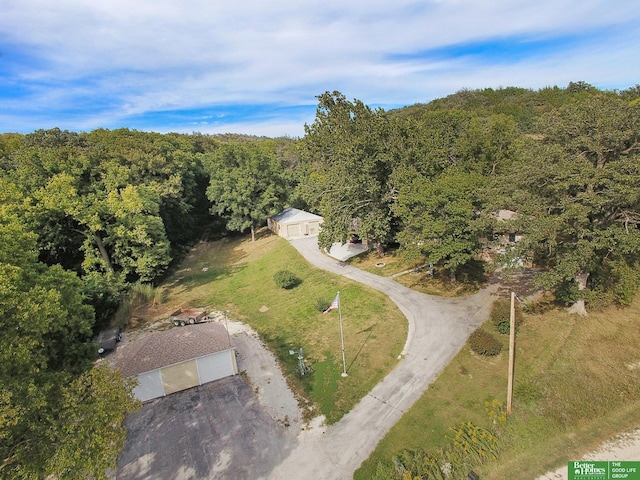 bird's eye view featuring a view of trees