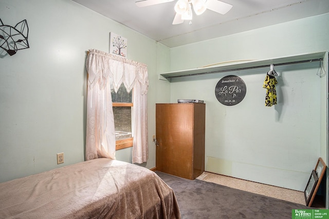 carpeted bedroom with ceiling fan