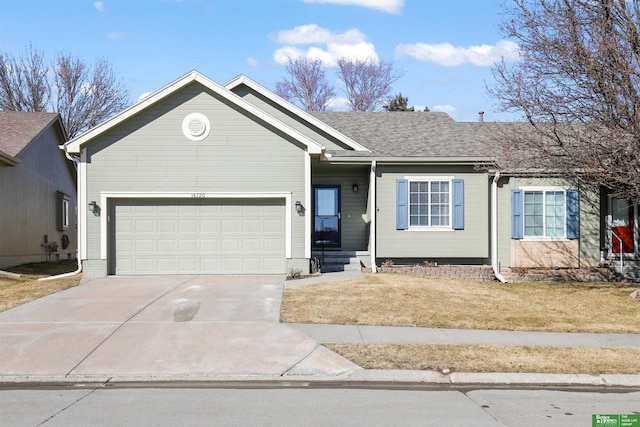 ranch-style house with concrete driveway, a front lawn, roof with shingles, and an attached garage