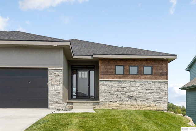 view of front of property featuring a garage, concrete driveway, stone siding, roof with shingles, and a front lawn