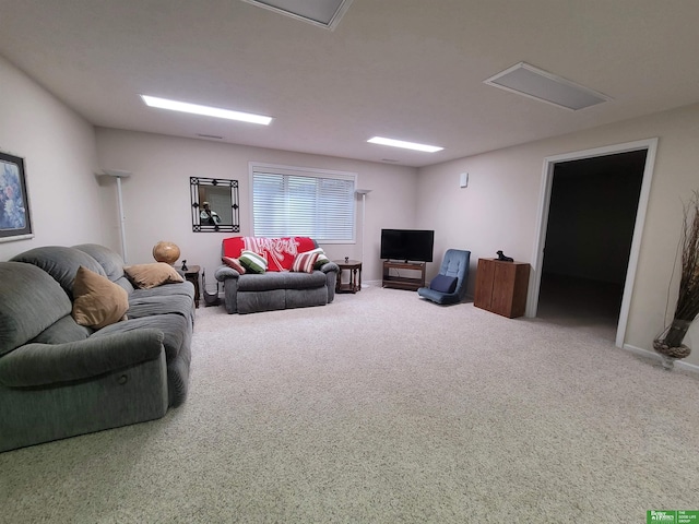 living area with carpet and baseboards