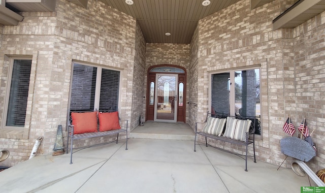 doorway to property featuring a porch