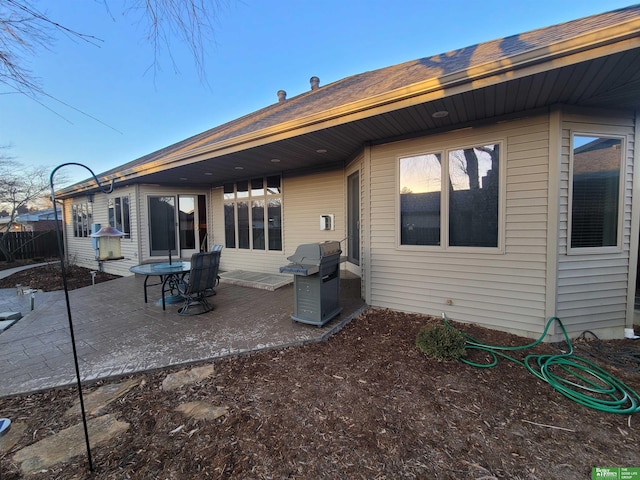 rear view of house featuring a patio