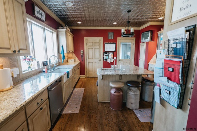 kitchen with ornamental molding, stainless steel dishwasher, a sink, and an ornate ceiling