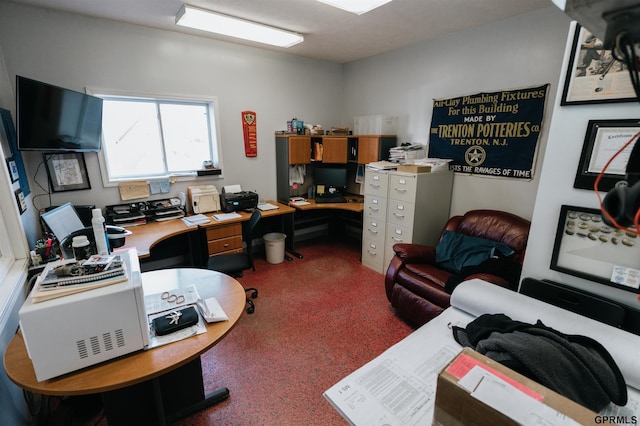 office area featuring speckled floor