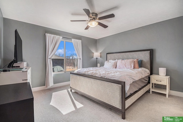 bedroom featuring carpet, baseboards, and ceiling fan