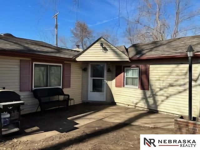 rear view of house with a patio area