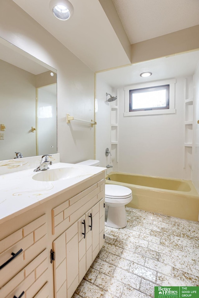 full bathroom with washtub / shower combination, recessed lighting, vanity, and toilet