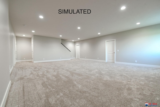 interior space with baseboards and recessed lighting