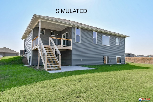 back of property with stairway, a deck, a lawn, and a patio