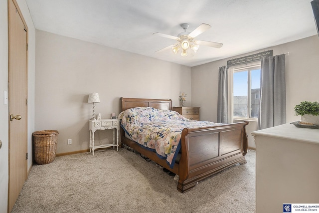 bedroom with light carpet, ceiling fan, and baseboards