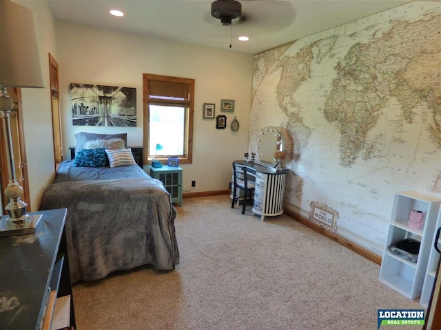 bedroom with wallpapered walls, carpet, baseboards, and recessed lighting