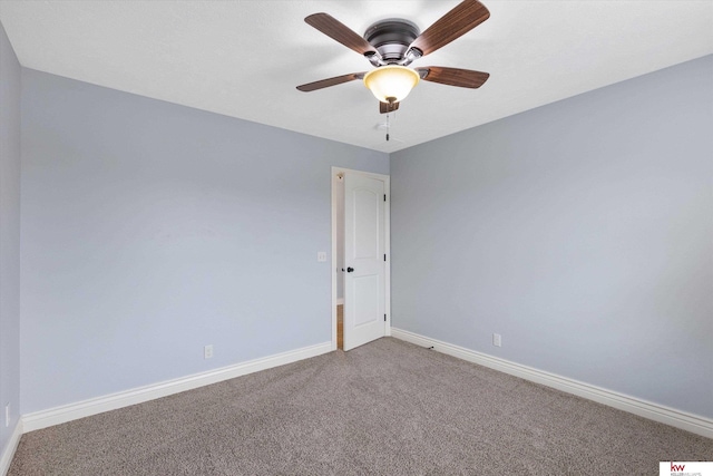 unfurnished room with carpet, ceiling fan, and baseboards