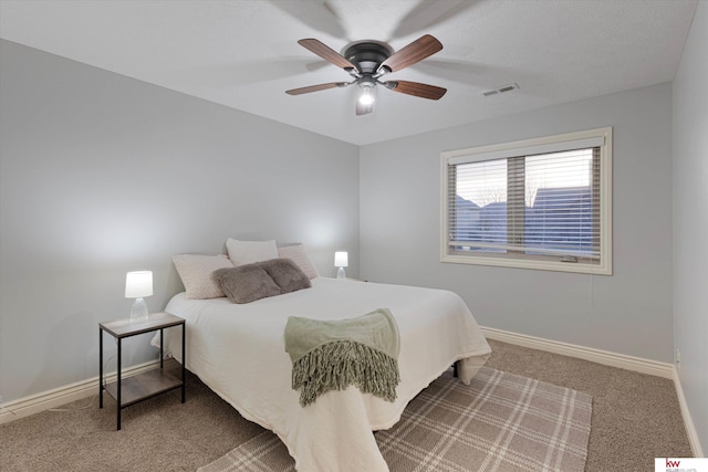 bedroom featuring carpet, visible vents, ceiling fan, and baseboards